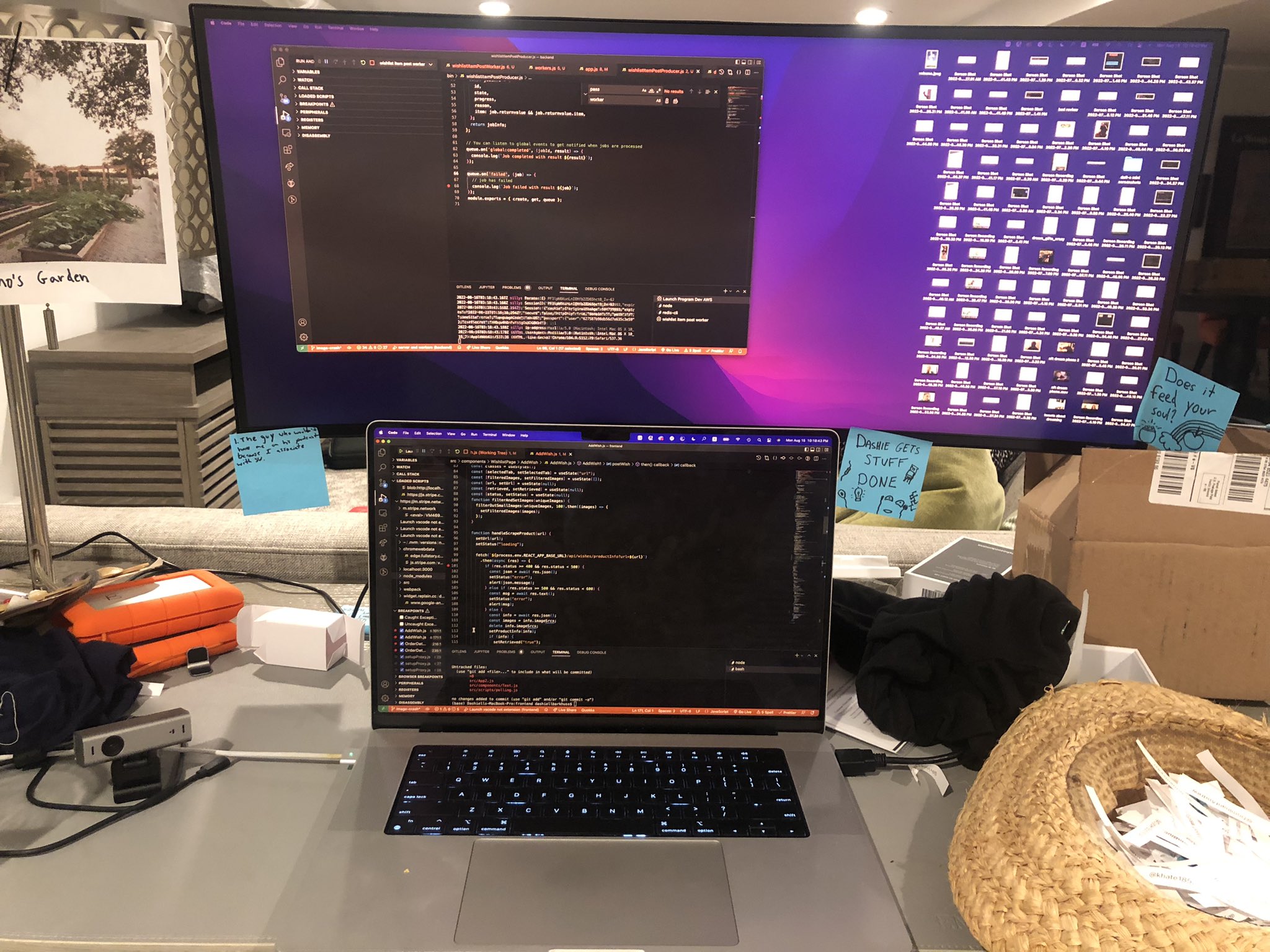 Picture of a desk with monitor. VS Code can be seen on the monitor.
